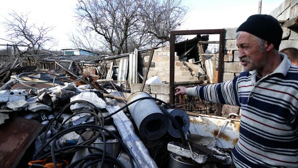Casa destruida en la región de Donetsk - Sputnik Mundo