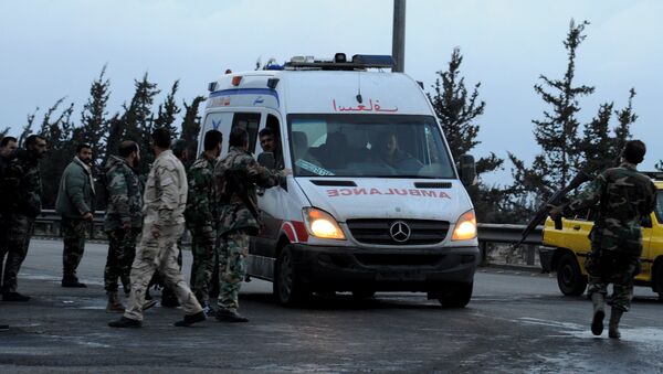 Ambulancia en el lugar del atentado en Damasco - Sputnik Mundo