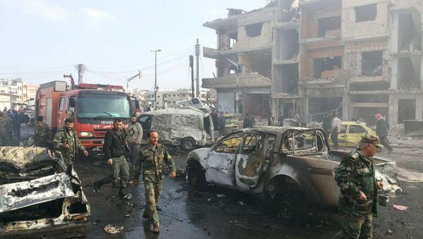 Lugar del atentado en la ciudad de Homs - Sputnik Mundo