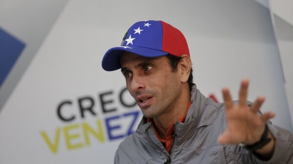 Venezuelan opposition leader and Governor of Miranda state Henrique Capriles speaks during an interview with Reuters in Caracas - Sputnik Mundo