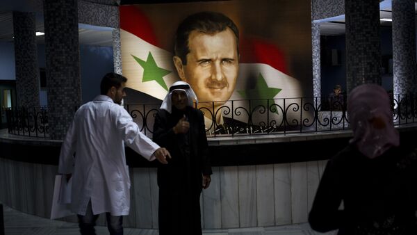 Retrato de Bashar Asad, presidente de Siria, en el Hospital de Damasco (archivo) - Sputnik Mundo