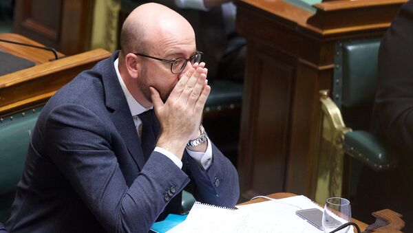 Belgian Prime Minister Charles Michel attends a plenary session of the Chamber at the federal Parliament, in Brussels, on March 24, 2016. - Sputnik Mundo