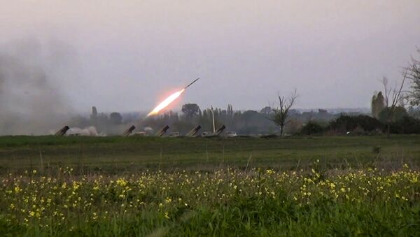 In this image made from video on Sunday, April  3, 2016, a Grad missile is fired by Azerbaijani forces in the village of Gapanli, Azerbaijan. - Sputnik Mundo