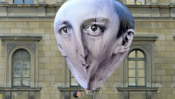 Globo aerostático con la imágen de David Cameron - Sputnik Mundo