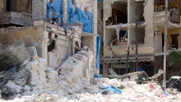 Hospital destruido en un ataque aéreo en Alepo - Sputnik Mundo