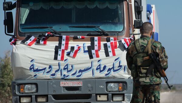 Convoy con la ayuda humanitaria para la localidad siria de Ibta - Sputnik Mundo