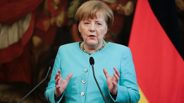 La canciller alemana, Angela Merkel, en una conferencia de prensa en Roma - Sputnik Mundo