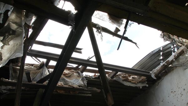 Las consecuencias del bombardeo de Dokuchaevsk en la región de Donetsk (archivo) - Sputnik Mundo