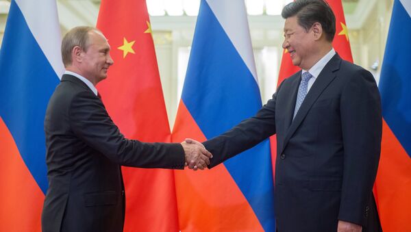 Presidente de Rusia, Vladímir Putin, y presidente de China, Xi Jinping (archivo) - Sputnik Mundo