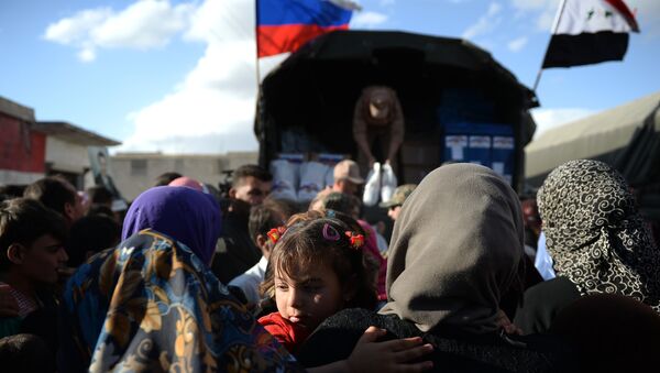 Rusia entrega seis toneladas de ayuda humanitaria a localidades sirias de Latakia - Sputnik Mundo