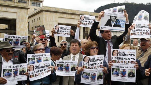 Demonstración en Bogotá para la liberación de la periodista española Salud Hernández Mora - Sputnik Mundo