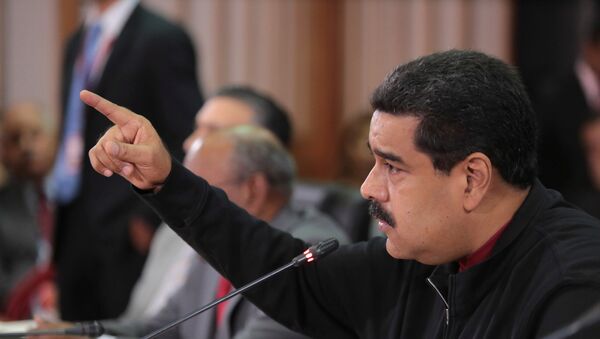 Venezuela's President Nicolas Maduro speaks during the 16th PetroCaribe Ministerial Council in Caracas - Sputnik Mundo