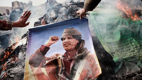 Retrato de Muamar Gadafi (archivo) - Sputnik Mundo