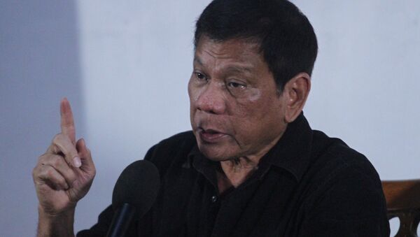 Rodrigo Duterte, el presidente de Filipinas,durante la rueda de prensa en Davao - Sputnik Mundo