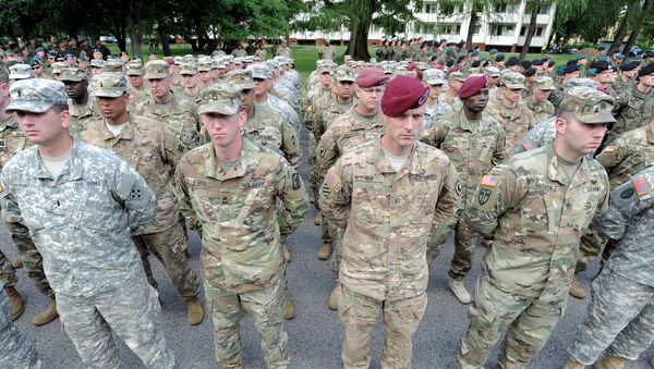 U.S. Army soldiers representing units participating in the the Anaconda-16 military exercise, attend the opening ceremony, in Warsaw, Poland - Sputnik Mundo