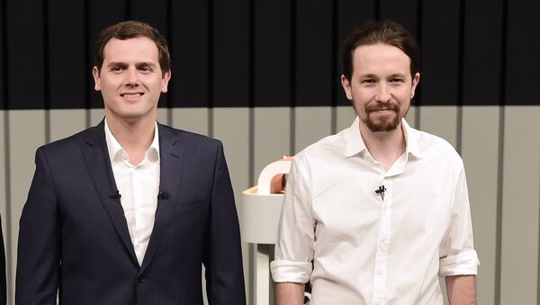 Leader of the People's Party (PP) and Spain's caretaker Prime Minister and party candidate, Mariano Rajoy, Leader of Spanish Socialist Party (PSOE), Pedro Sanchez, Center-right party Ciudadanos leader and party candidate, Albert Rivera,(C), and Leader of left wing party Podemos and party candidate, Pablo Iglesias, pose prior to a televised debate at the congress centre IFEMA in Madrid on June 13, 2016 ahead of Spain's general election. - Sputnik Mundo