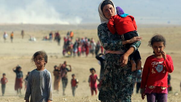 Kurdos yazidíes intentado huir de Daesh - Sputnik Mundo