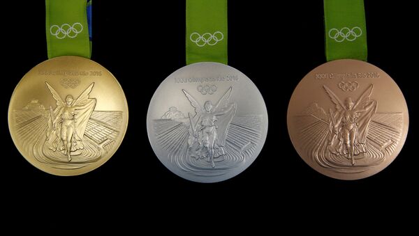 Las medallas olímpicas delos JJOO de Río-2016 - Sputnik Mundo