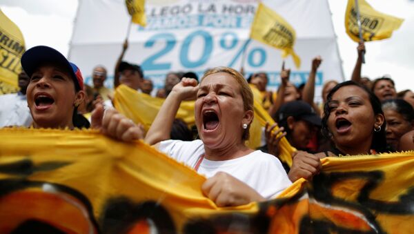 Una manifestación de los partidarios de la oposición en Caracas - Sputnik Mundo
