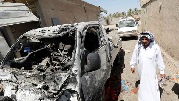 El atentado con coche bomba, Rashidiya, el norte de Bagdad - Sputnik Mundo