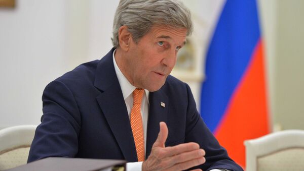 John Kerry, secretario de Estado de EEUU, durante la reunión con el presidente ruso Vladímir Putin en Moscú - Sputnik Mundo