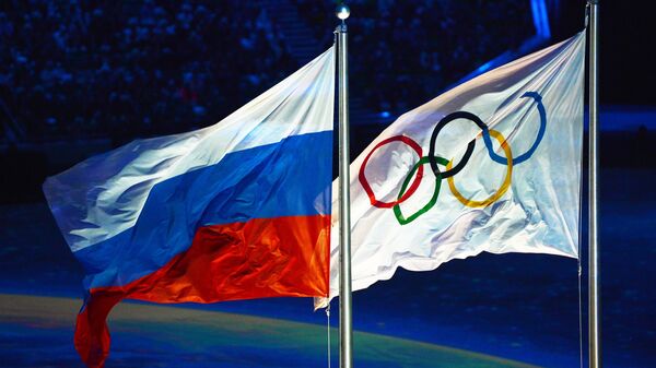 Las banderas de Rusia y de los JJOO (archivo) - Sputnik Mundo