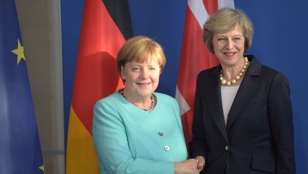 Angela Merkel, canciller de Alemania, y Theresa May, primera ministra de Reino Unido - Sputnik Mundo