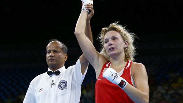 La boxeadora rusa Belyakova gana el bronce en peso ligero en Río - Sputnik Mundo