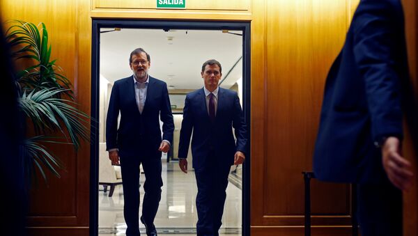 Presidente del Gobierno en funciones y candidato oficial a la investidura, Mariano Rajoy y presidente de Ciudadanos, Albert Rivera - Sputnik Mundo