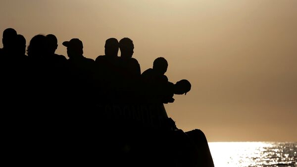 Los migrantes de Libia (Archivo) - Sputnik Mundo