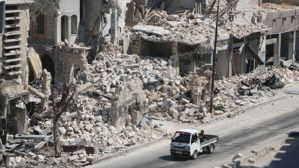 Un barrio destruido en Alepo - Sputnik Mundo