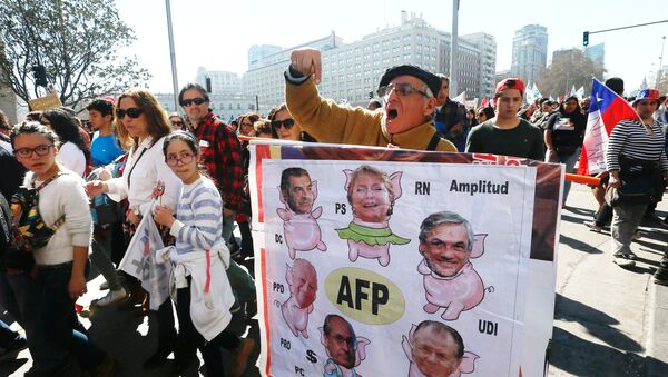 Una protesta en Chile - Sputnik Mundo