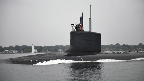 In this July 29, 2016 photo provided by General Dynamics Electric Boat, the submarine USS Illinois travels along the Thames River after departing General Dynamics Electric Boat in Groton, Conn., for initial sea trials, where the ship's performance is tested prior to delivery to the U.S. Navy. - Sputnik Mundo