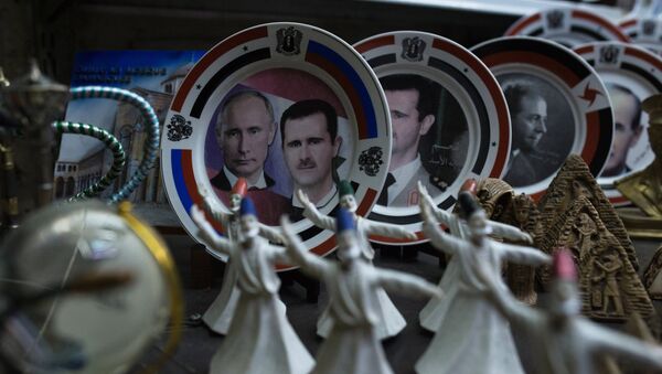 Retratos de Vladímir Putin y Bashar Asad (archivo) - Sputnik Mundo