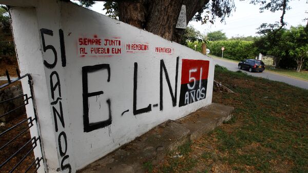 A graffiti, of rebel group Army Liberation National (ELN) is seen at the entrance of the cemetery of El Palo, Cauca, Colombia, February 10, 2016. - Sputnik Mundo