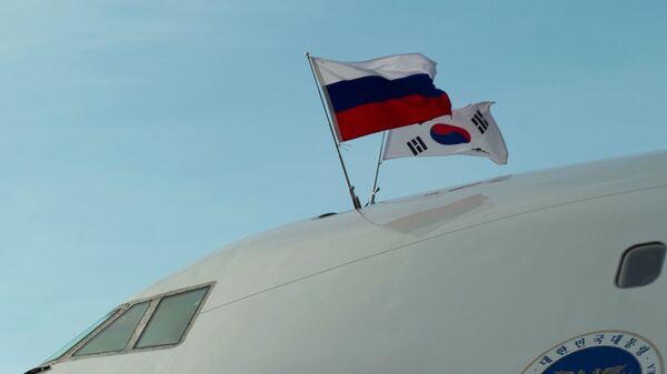 Las banderas de Rusia y Corea del Sur (archivo) - Sputnik Mundo