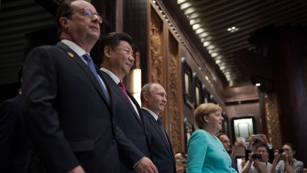 French President Francois Hollande, Chinese President Xi Jinping, Russia's President Vladimir Putin and German Chancellor Angela Merkel - Sputnik Mundo