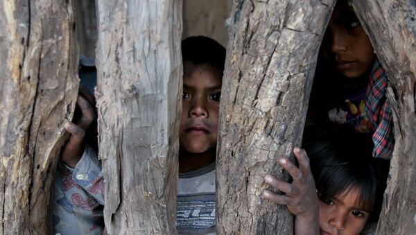 Unos niños del pueblo indígena argentino Toba - Sputnik Mundo