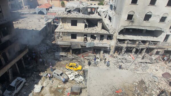 Las consecuencias del ataque aéreo en Idlib (archivo) - Sputnik Mundo