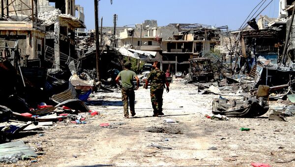 Los soldados sirios en la parte liberada de terroristas en Alepo - Sputnik Mundo