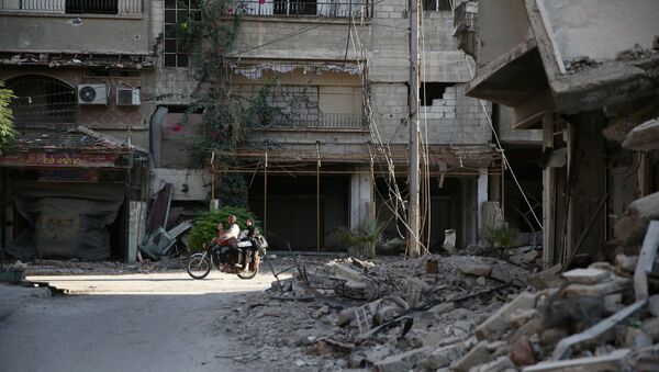 Edificios destruidos en Damasco (archivo) - Sputnik Mundo