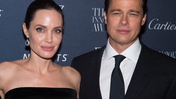 Brad Pitt y Angelina Jolie - Sputnik Mundo