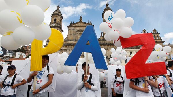 Manifestación a favor del Acuerdo de Paz en Colombia - Sputnik Mundo
