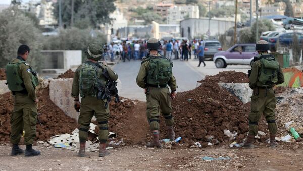 Soldados israelíes durante una protesta en Nablus (archivo) - Sputnik Mundo