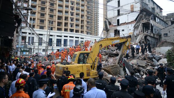 Derrumbre de los edificios en la provincia china de Zhejiang - Sputnik Mundo