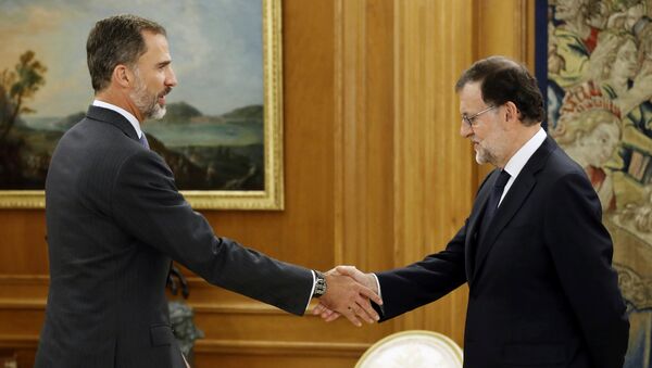 El Rey Felipe VI y el primer ministro de España, Mariano Rajoy - Sputnik Mundo