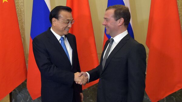 Premier de la República Popular China, Li Keqiang, y primer ministro ruso, Dmitri Medvédev - Sputnik Mundo