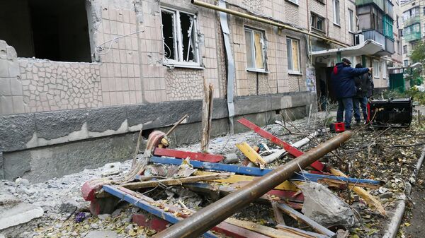 Consecuencias de bombardeo en Makéevka, Donbás - Sputnik Mundo