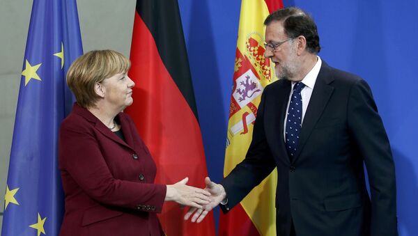 La canciller de Almeania, Angela Merkel, y el primer ministro de España, Mariano Rajoy - Sputnik Mundo