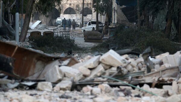 Una zona destruida por la guerra, en Alepo (archivo) - Sputnik Mundo